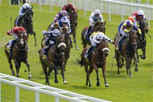 YORK, ENGLAND - MAY 11: Connor Beasley riding Dakota Gold (white cap/stars) win The Churchill Tyres Handicap at York Racecourse on May 11, 2022 in York, England. (Photo by Alan Crowhurst/Getty Images)