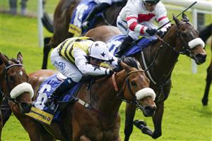 YORK, ENGLAND - MAY 11: Connor Beasley riding Dakota Gold (white cap/stars) win The Churchill Tyres Handicap at York Racecourse on May 11, 2022 in York, England. (Photo by Alan Crowhurst/Getty Images)