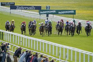 YORK, ENGLAND - MAY 11: Connor Beasley riding Dakota Gold (white cap/stars) win The Churchill Tyres Handicap at York Racecourse on May 11, 2022 in York, England. (Photo by Alan Crowhurst/Getty Images)