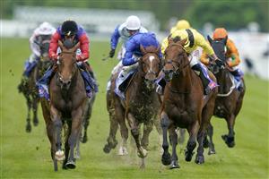 YORK, ENGLAND - MAY 11: Tom Marquand riding Gaassee (yellow) win The Sky Bet Race To The Ebor Jorvik Handicap at York Racecourse on May 11, 2022 in York, England. (Photo by Alan Crowhurst/Getty Images)