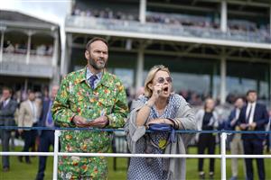 YORK, ENGLAND - MAY 11: Racegoers watch the action at York Racecourse on May 11, 2022 in York, England. (Photo by Alan Crowhurst/Getty Images)