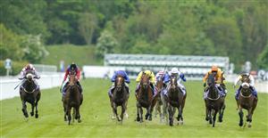 YORK, ENGLAND - MAY 11: Tom Marquand riding Gaassee (C, yellow) win The Sky Bet Race To The Ebor Jorvik Handicap at York Racecourse on May 11, 2022 in York, England. (Photo by Alan Crowhurst/Getty Images)