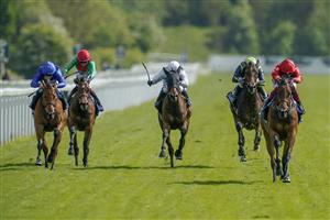 YORK, ENGLAND - MAY 11: Frankie Dettori riding Emily Upjohn (red) win The Tattersalls Musidora Stakes at York Racecourse on May 11, 2022 in York, England. (Photo by Alan Crowhurst/Getty Images)