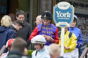 YORK, ENGLAND - MAY 11: Ryan Moore enters the parade ring at York Racecourse on May 11, 2022 in York, England. (Photo by Alan Crowhurst/Getty Images)