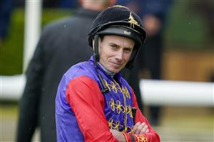 YORK, ENGLAND - MAY 11: Ryan Moore poses in the Queen's silks at York Racecourse on May 11, 2022 in York, England. (Photo by Alan Crowhurst/Getty Images)