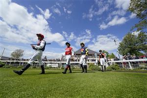 YORK, ENGLAND - MAY 12: Jockeys enter the parade ring at York Racecourse on May 12, 2022 in York, England. (Photo by Alan Crowhurst/Getty Images)