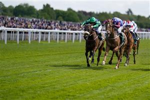 YORK, ENGLAND - MAY 12: David Allan riding Cruyff Turn (blue/red) win The Paddy Power Hambleton Handicap at York Racecourse on May 12, 2022 in York, England. (Photo by Alan Crowhurst/Getty Images)