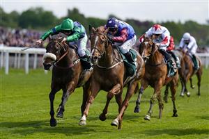 YORK, ENGLAND - MAY 12: David Allan riding Cruyff Turn (blue/red) win The Paddy Power Hambleton Handicap at York Racecourse on May 12, 2022 in York, England. (Photo by Alan Crowhurst/Getty Images)