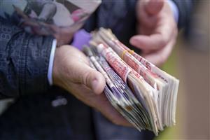 YORK, ENGLAND - MAY 12: Plenty of money in the betting ring at York Racecourse on May 12, 2022 in York, England. (Photo by Alan Crowhurst/Getty Images)