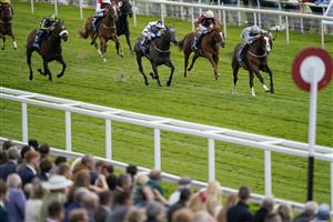 YORK, ENGLAND - MAY 12: Daniel Tudhope riding Last Crusader (R) win The British Stallion Studs EBF Westow Stakes at York Racecourse on May 12, 2022 in York, England. (Photo by Alan Crowhurst/Getty Images)