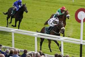 YORK, ENGLAND - MAY 13: Clifford Lee riding Al Qareem win The Paddy Power 'Fill Thi Boots' Handicap at York Racecourse on May 13, 2022 in York, England. (Photo by Alan Crowhurst/Getty Images)