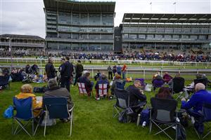 YORK, ENGLAND - MAY 13: A general view as racegoers in the Clocktower Enclosure wait for the start of the first race at York Racecourse on May 13, 2022 in York, England. (Photo by Alan Crowhurst/Getty Images)