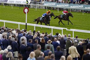 YORK, ENGLAND - MAY 13: Duran Fentiman riding Bollin Joan (blue) win The Paddy Power 'I Love Steak' Handicap at York Racecourse on May 13, 2022 in York, England. (Photo by Alan Crowhurst/Getty Images)