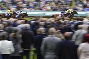 YORK, ENGLAND - MAY 13: Andrea Atzeni riding Fonteyn (R, yellow) win The Oaks Farm Stables Fillies' Stakes at York Racecourse on May 13, 2022 in York, England. (Photo by Alan Crowhurst/Getty Images)