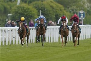 YORK, ENGLAND - MAY 13: Frankie Dettori riding Stradivarius (yellow cap) win The Paddy Power Yorkshire Cup Stakes at York Racecourse on May 13, 2022 in York, England. (Photo by Alan Crowhurst/Getty Images)