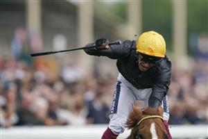 YORK, ENGLAND - MAY 13: Frankie Dettori celebrates victory as he rides Stradivarius to win The Paddy Power Yorkshire Cup Stakes at York Racecourse on May 13, 2022 in York, England. (Photo by Alan Crowhurst/Getty Images)