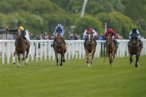 YORK, ENGLAND - MAY 13: Frankie Dettori riding Stradivarius (yellow cap) win The Paddy Power Yorkshire Cup Stakes at York Racecourse on May 13, 2022 in York, England. (Photo by Alan Crowhurst/Getty Images)