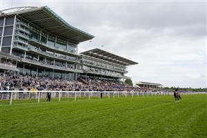 YORK, ENGLAND - MAY 13: Frankie Dettori celebrates in front of the grandstands after riding Stradivarius to victory in The Paddy Power Yorkshire Cup Stakes at York Racecourse on May 13, 2022 in York, England. (Photo by Alan Crowhurst/Getty Images)