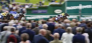 YORK, ENGLAND - MAY 13: Andrea Atzeni riding Fonteyn (R, yellow) win The Oaks Farm Stables Fillies' Stakes at York Racecourse on May 13, 2022 in York, England. (Photo by Alan Crowhurst/Getty Images)