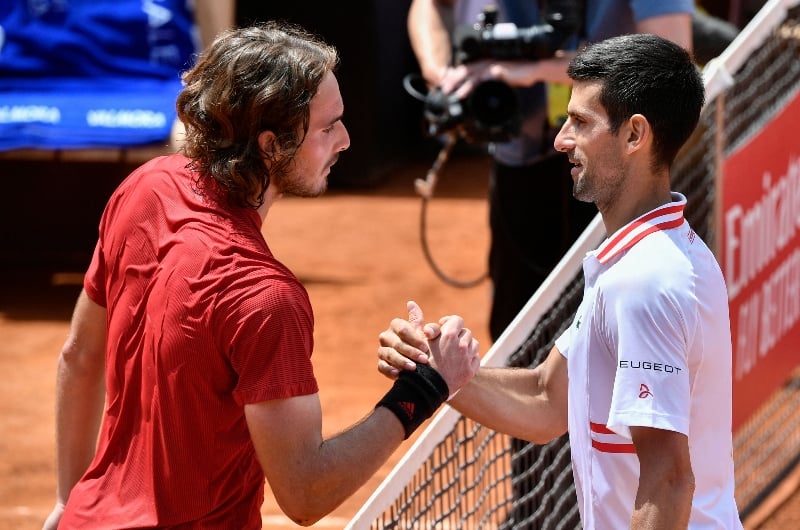 Novak Djokovic Stefanos Tsitsipas hands