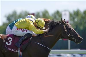 NEWBURY, ENGLAND - MAY 14: Tom Marquand riding Ilaraab (yellow) win The Al Rayyan Stakes at Newbury Racecourse on May 14, 2022 in Newbury, England. (Photo by Alan Crowhurst/Getty Images)