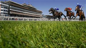 NEWBURY, ENGLAND - MAY 14: Jim Crowley riding Israr (L, blue) win The BetVictor London Gold Cup Handicap at Newbury Racecourse on May 14, 2022 in Newbury, England. (Photo by Alan Crowhurst/Getty Images)