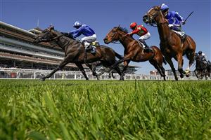 NEWBURY, ENGLAND - MAY 14: Jim Crowley riding Israr (L, blue) win The BetVictor London Gold Cup Handicap at Newbury Racecourse on May 14, 2022 in Newbury, England. (Photo by Alan Crowhurst/Getty Images)