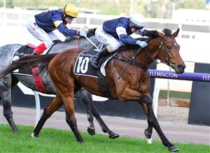 MELBOURNE, AUSTRALIA - MAY 14: Alana Kelly riding Point Nepean winning Race 7, the Lexus Andrew Ramsden, during Melbourne Racing at Flemington Racecourse on May 14, 2022 in Melbourne, Australia. (Photo by Vince Caligiuri/Getty Images)