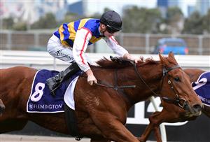 MELBOURNE, AUSTRALIA - MAY 14: Teodore Nugent riding Jimmy The Bear winning Race 6, the Silver Bowl Series Heat 1, during Melbourne Racing at Flemington Racecourse on May 14, 2022 in Melbourne, Australia. (Photo by Vince Caligiuri/Getty Images)