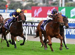 MELBOURNE, AUSTRALIA - MAY 14: Teodore Nugent riding Jimmy The Bear winning Race 6, the Silver Bowl Series Heat 1, during Melbourne Racing at Flemington Racecourse on May 14, 2022 in Melbourne, Australia. (Photo by Vince Caligiuri/Getty Images)