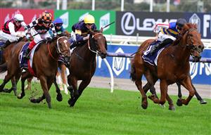 MELBOURNE, AUSTRALIA - MAY 14: Teodore Nugent riding Jimmy The Bear winning Race 6, the Silver Bowl Series Heat 1, during Melbourne Racing at Flemington Racecourse on May 14, 2022 in Melbourne, Australia. (Photo by Vince Caligiuri/Getty Images)