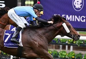 MELBOURNE, AUSTRALIA - MAY 14: Matthew Cartwright riding Flash Feeling winning Race 3, the Mahogany Challenge Series Heat 2, during Melbourne Racing at Flemington Racecourse on May 14, 2022 in Melbourne, Australia. (Photo by Vince Caligiuri/Getty Images)