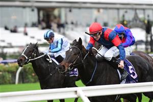MELBOURNE, AUSTRALIA - MAY 14: Matthew Cartwright riding No Way Ever winning Race 2, the Flemington Fillies Sprint, during Melbourne Racing at Flemington Racecourse on May 14, 2022 in Melbourne, Australia. (Photo by Vince Caligiuri/Getty Images)
