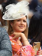 EPSOM, ENGLAND - JUNE 03: A female spectator looks on during Ladies Day at Epsom Racecourse on June 03, 2022 in Epsom, England. (Photo by Andrew Redington/Getty Images)