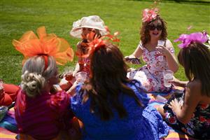 EPSOM, ENGLAND - JUNE 03: Fashion during Ladies Day at Epsom Racecourse on June 03, 2022 in Epsom, England. (Photo by Alan Crowhurst/Getty Images)