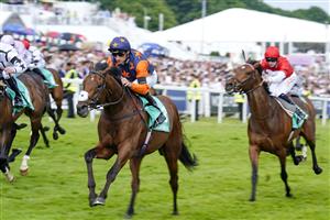 EPSOM, ENGLAND - JUNE 03: Daniel Tudhope riding Ever Given win The Poundland Surrey Stakes during Ladies Day at Epsom Racecourse on June 03, 2022 in Epsom, England. (Photo by Alan Crowhurst/Getty Images)