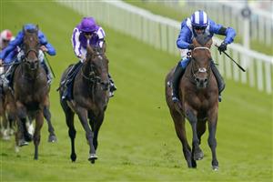 EPSOM, ENGLAND - JUNE 03: Jim Crowley riding Hukum (R) win The Dahlbury Coronation Cup during Ladies Day at Epsom Racecourse on June 03, 2022 in Epsom, England. (Photo by Alan Crowhurst/Getty Images)