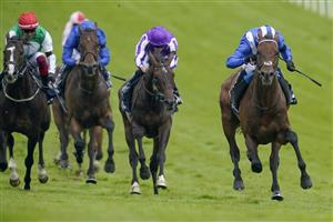 EPSOM, ENGLAND - JUNE 03: Jim Crowley riding Hukum (R) win The Dahlbury Coronation Cup during Ladies Day at Epsom Racecourse on June 03, 2022 in Epsom, England. (Photo by Alan Crowhurst/Getty Images)