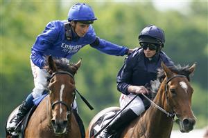 EPSOM, ENGLAND - JUNE 03: Jockey William Buick (L) congratulates Ryan Moore after he rides Tuesday to win The Cazoo Oaks during Ladies Day at Epsom Racecourse on June 03, 2022 in Epsom, England. (Photo by Alan Crowhurst/Getty Images)
