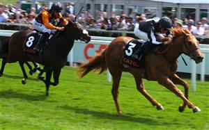 EPSOM, ENGLAND - JUNE 03: William Buick riding Legend of Xanadu (far right) to victory in the Cazoo Woodcote British EBF Stakes during Ladies Day at Epsom Racecourse on June 03, 2022 in Epsom, England. (Photo by Andrew Redington/Getty Images)