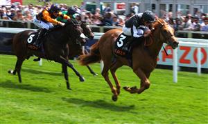 EPSOM, ENGLAND - JUNE 03: William Buick riding Legend of Xanadu (far right) to victory in the Cazoo Woodcote British EBF Stakes during Ladies Day at Epsom Racecourse on June 03, 2022 in Epsom, England. (Photo by Andrew Redington/Getty Images)