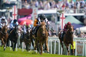 EPSOM, ENGLAND - JUNE 03: William Buick riding Legend Of Xanadu (C, black/white) win The Cazoo Woodcote British EBF Stakes during Ladies Day at Epsom Racecourse on June 03, 2022 in Epsom, England. (Photo by Alan Crowhurst/Getty Images)