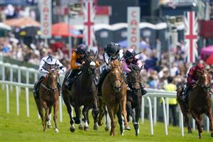 EPSOM, ENGLAND - JUNE 03: William Buick riding Legend Of Xanadu (C, black/white) win The Cazoo Woodcote British EBF Stakes during Ladies Day at Epsom Racecourse on June 03, 2022 in Epsom, England. (Photo by Alan Crowhurst/Getty Images)