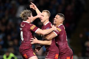 SYDNEY, AUSTRALIA - JUNE 08: Daly Cherry-Evans of the Maroons celebrates with teammates after scoring a try during game one of the 2022 State of Origin series between the New South Wales Blues and the Queensland Maroons at Accor Stadium on June 08, 2022 in Sydney, Australia. (Photo by Cameron Spencer/Getty Images)
