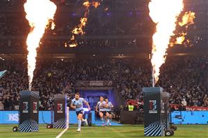 SYDNEY, AUSTRALIA - JUNE 08: James Tedesco of the Blues leads out his teammates during game one of the 2022 State of Origin series between the New South Wales Blues and the Queensland Maroons at Accor Stadium on June 08, 2022 in Sydney, Australia. (Photo by Cameron Spencer/Getty Images)