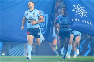 SYDNEY, AUSTRALIA - JUNE 08: Blues captain James Tedesco leads the Blues onto the field during game one of the 2022 State of Origin series between the New South Wales Blues and the Queensland Maroons at Accor Stadium on June 08, 2022, in Sydney, Australia. (Photo by Mark Kolbe/Getty Images)