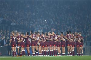 SYDNEY, AUSTRALIA - JUNE 08: Maroon players line up for the national anthem ahead of the during game one of the 2022 State of Origin series between the New South Wales Blues and the Queensland Maroons at Accor Stadium on June 08, 2022 in Sydney, Australia. (Photo by Cameron Spencer/Getty Images)