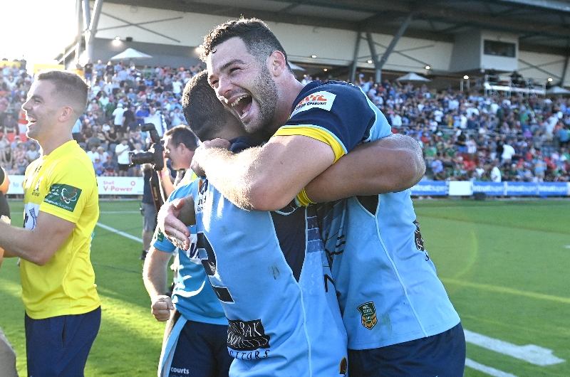 Connor Broadhurst and Leivaha Pulu of the Devils