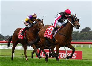 MELBOURNE, AUSTRALIA - JUNE 11: Alana Kelly riding Umgawa winning Race 8, the Ladbrokes Same Race Multi Handicap, during Melbourne Racing at Sandown Hillside on June 11, 2022 in Melbourne, Australia. (Photo by Vince Caligiuri/Getty Images)