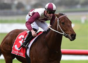 MELBOURNE, AUSTRALIA - JUNE 11: Teodore Nugent riding Ashford Street winning Race 2, the Ladbroke It Handicap, during Melbourne Racing at Sandown Hillside on June 11, 2022 in Melbourne, Australia. (Photo by Vince Caligiuri/Getty Images)